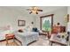 Bedroom with wood furniture and a view at 7884 N Lake Buffum Shores Rd, Fort Meade, FL 33841