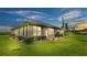Single story home with backyard and patio at 7884 N Lake Buffum Shores Rd, Fort Meade, FL 33841