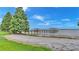 Picturesque waterfront view with sandy beach and dock at 7884 N Lake Buffum Shores Rd, Fort Meade, FL 33841