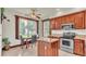 Kitchen with stainless steel appliances, island, and view at 7884 N Lake Buffum Shores Rd, Fort Meade, FL 33841