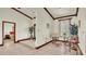 Inviting entryway with views to the living room and a bedroom at 7884 N Lake Buffum Shores Rd, Fort Meade, FL 33841