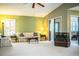Relaxing living room with a sofa, coffee table, and access to sunroom at 6217 Crane Dr, Lakeland, FL 33809