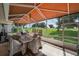 Spacious screened patio overlooking a golf course at 6803 Hermitage Dr, Lakeland, FL 33810
