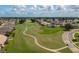 Golf course community with winding cart paths at 6803 Hermitage Dr Dr, Lakeland, FL 33810