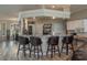 Kitchen with breakfast bar and granite countertops at 6803 Hermitage Dr, Lakeland, FL 33810