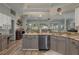 Modern kitchen with granite countertops and stainless steel appliances at 6803 Hermitage Dr, Lakeland, FL 33810