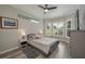 Bright bedroom with bay windows and ceiling fan at 6803 Hermitage Dr, Lakeland, FL 33810