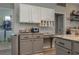 Laundry room with washer, dryer and additional cabinets at 6803 Hermitage Dr, Lakeland, FL 33810