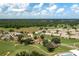 Aerial view showing home's location in a golf course community at 6803 Hermitage Dr, Lakeland, FL 33810