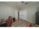 Spacious home office with hardwood floors and lots of natural light at 6803 Hermitage Dr, Lakeland, FL 33810