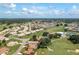 Wide view of the home and surrounding community at 6803 Hermitage Dr, Lakeland, FL 33810