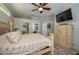 Spacious primary bedroom with large windows and hardwood floors at 6803 Hermitage Dr, Lakeland, FL 33810