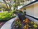 Landscaped walkway leading to the home entrance at 1323 Hammock Shade Dr, Lakeland, FL 33809