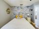 Bright bedroom with dandelion wall art and ceiling fan at 1323 Hammock Shade Dr, Lakeland, FL 33809