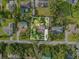 An aerial view showcasing a home's location in a residential neighborhood at 1323 Hammock Shade Dr, Lakeland, FL 33809