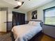 Cozy bedroom with a ceiling fan and hardwood floors at 1323 Hammock Shade Dr, Lakeland, FL 33809