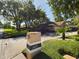 Address marker for 1323, with landscaping and street view at 1323 Hammock Shade Dr, Lakeland, FL 33809