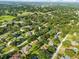 Aerial view highlighting the property's location in a quiet residential neighborhood at 1323 Hammock Shade Dr, Lakeland, FL 33809