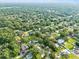 Aerial perspective showcasing a home's location within a residential neighborhood at 1323 Hammock Shade Dr, Lakeland, FL 33809