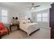 Comfortable bedroom with a king-size bed and plenty of natural light at 7914 Lake James Blvd, Lakeland, FL 33810