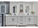 Double vanity bathroom with marble countertop and modern fixtures at 659 Howard Ave, Lakeland, FL 33815