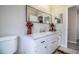 Clean bathroom with marble countertop and large mirror at 11 Loma Verde # 11, Lakeland, FL 33813