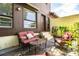 Cozy patio with wicker furniture, perfect for relaxing at 11 Loma Verde # 11, Lakeland, FL 33813