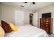 Spacious bedroom with a dresser and a view of another room at 11 Loma Verde # 11, Lakeland, FL 33813