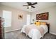 Well-lit bedroom with a double bed and ceiling fan at 11 Loma Verde # 11, Lakeland, FL 33813
