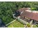 Two-story townhomes with a shared courtyard at 11 Loma Verde # 11, Lakeland, FL 33813