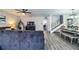 Spacious living room with sectional sofa, fireplace and hardwood floors at 11 Loma Verde # 11, Lakeland, FL 33813