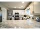 Modern kitchen with stainless steel appliances and white cabinetry at 11 Loma Verde # 11, Lakeland, FL 33813