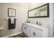 Modern bathroom with marble vanity and large mirror at 11 Loma Verde # 11, Lakeland, FL 33813