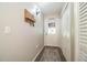Inviting entryway with built-in shelving and coat hooks at 11 Loma Verde # 11, Lakeland, FL 33813