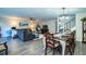 Open living and dining area with hardwood floors and modern decor at 11 Loma Verde # 11, Lakeland, FL 33813