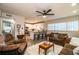 Open concept living room, kitchen, and breakfast bar with modern finishes at 11 Loma Verde # 11, Lakeland, FL 33813