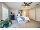 Bright bedroom with ample closet space and ceiling fan at 11 Loma Verde # 11, Lakeland, FL 33813
