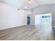 Spacious living room with hardwood floors and an open floor plan at 665 Lake Clark Pl, Lakeland, FL 33813