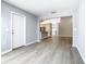 Living room with view into kitchen and dining area at 665 Lake Clark Pl, Lakeland, FL 33813