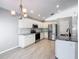 Modern kitchen with stainless steel appliances and granite countertops at 665 Lake Clark Pl, Lakeland, FL 33813