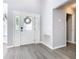 Bright entryway with white door, glass accents, and gray walls at 665 Lake Clark Pl, Lakeland, FL 33813