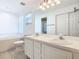 Bathroom with double vanity and garden tub at 665 Lake Clark Pl, Lakeland, FL 33813