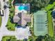 Overhead view of the community pool and tennis court at 665 Lake Clark Pl, Lakeland, FL 33813
