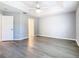 Bright bedroom with ceiling fan and vinyl flooring at 665 Lake Clark Pl, Lakeland, FL 33813