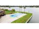 Inviting community pool with lake views at 1920 E Edgewood Dr # G5, Lakeland, FL 33803