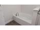 Relaxing bathtub with modern fixtures and neutral color palette at 4544 Grand View Glen Dr, Auburndale, FL 33823