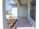 Covered front porch with paver walkway at 4544 Grand View Glen Dr, Auburndale, FL 33823