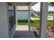 Covered front porch with paver walkway at 4544 Grand View Glen Dr, Auburndale, FL 33823