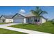 One story home with gray roof and light gray siding at 4544 Grand View Glen Dr, Auburndale, FL 33823