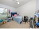 Bright bedroom with plush bed and window coverings at 244 Sweet Bay St, Davenport, FL 33837